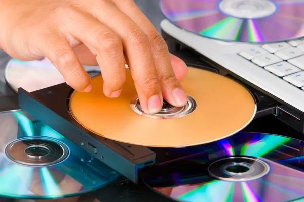 Inserting the DVD — Stock Photo, Image
