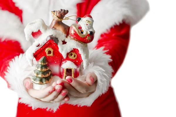 Санта-Клаус с подарком в руках — стоковое фото