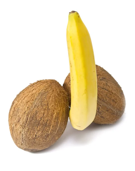 Kokosnötter och en banan — Stockfoto