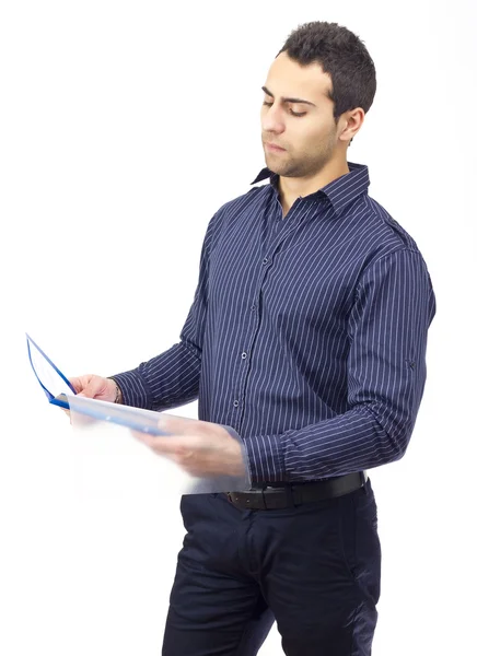 Standing business man reading contract — Stock Photo, Image