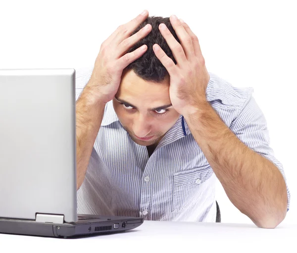 Affärsman med huvudvärk på jobbet — Stockfoto