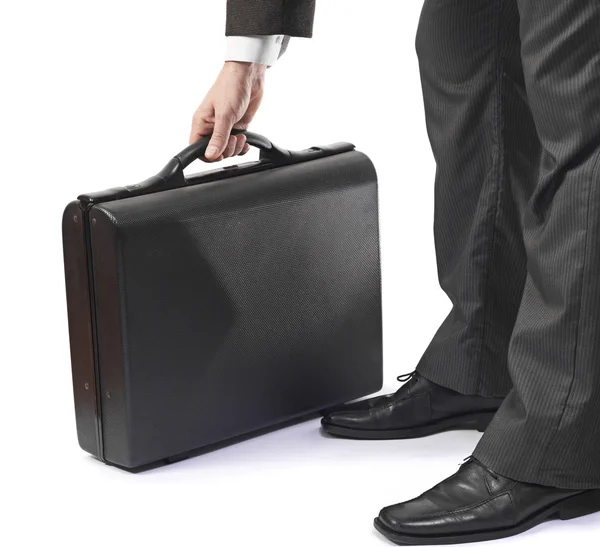 Elegante uomo d'affari in tuta con valigetta nera — Foto Stock