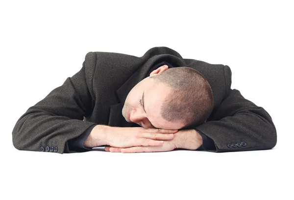Взрослый бизнесмен спит на работе — стоковое фото