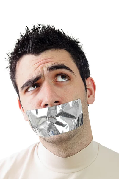Young man having gray duct tape on his mouth — Stock Photo, Image