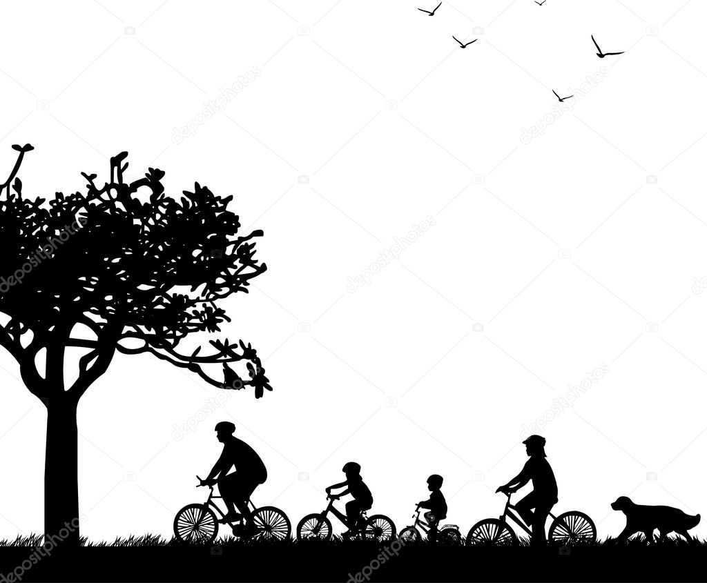 Family bike ride in park in spring or summer silhouette,