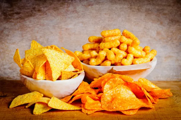 Chips, nachos and curls — Stock Photo, Image