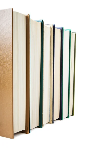 Stack med böcker på en vit bakgrund — Stockfoto