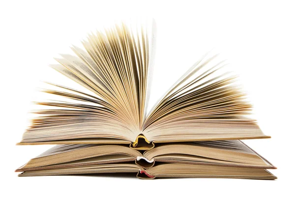 Stack of open books on a white background — Stock Photo, Image