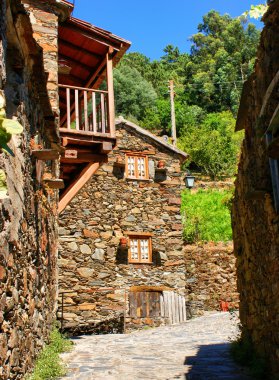 Small typical mountain village of schist clipart