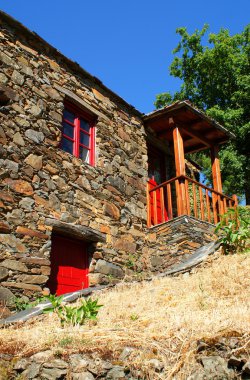 Small typical mountain village of schist in Lousa, Portugal clipart