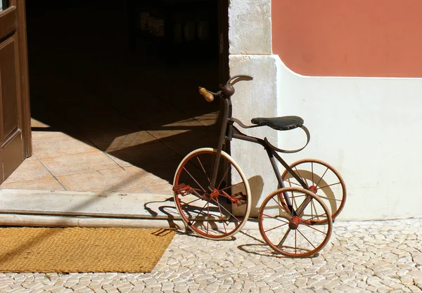 Triciclo da criança velha — Fotografia de Stock