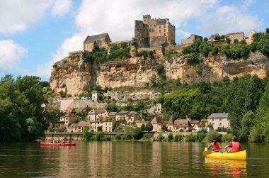Kayaking on river Dordogne in France clipart