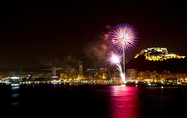 Alicante City by Night with Blue and Red Fireworks — Stock Photo, Image