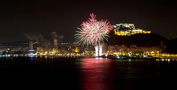 Alicante City by Night with Red and Green Star Fireworks — Stock Photo, Image