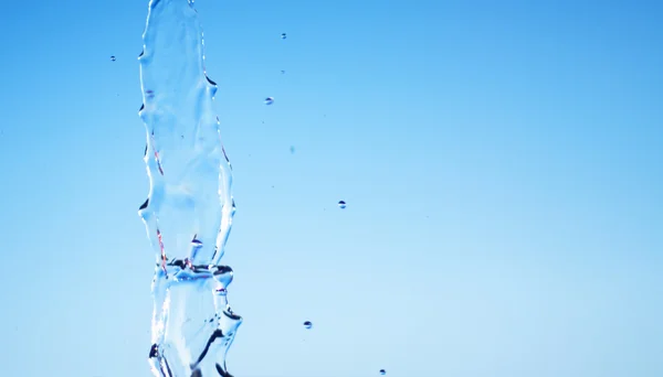 Salpicadura de agua que cae abstracta —  Fotos de Stock