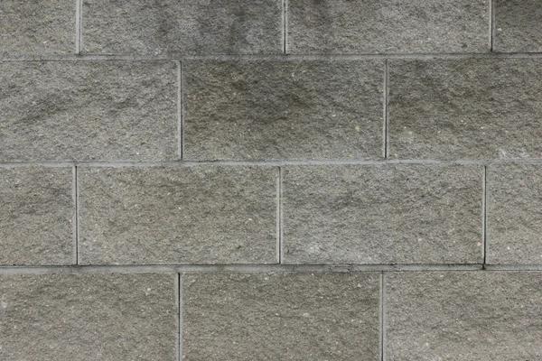 Uma parede de tijolo cinza — Fotografia de Stock