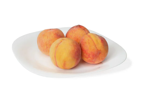 Peaches on the plate — Stock Photo, Image