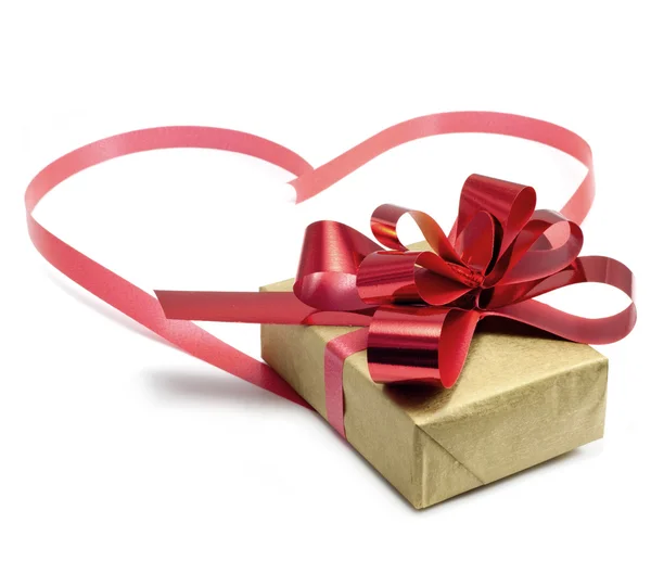 Geschenk ribbon bow en hart op een witte achtergrond — Stockfoto