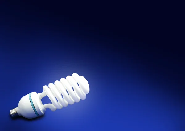 Fluorescent bulb on blue background — Stock Photo, Image