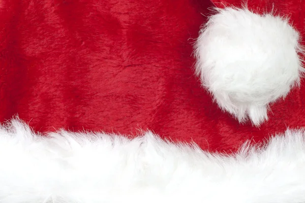 Санта-Клаус шляпа красный рождественский фон — стоковое фото