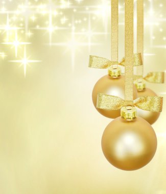 Christmas golden background with blur stars and baubles clipart