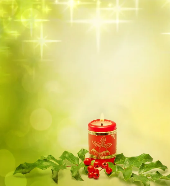 Christmas candle and evergreen against bokeh background — Stock Photo, Image