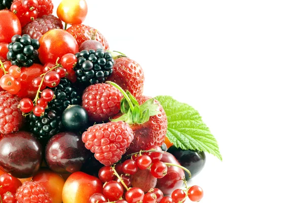 Assortment of fresh berries and fruits stack pile — Stock Photo, Image