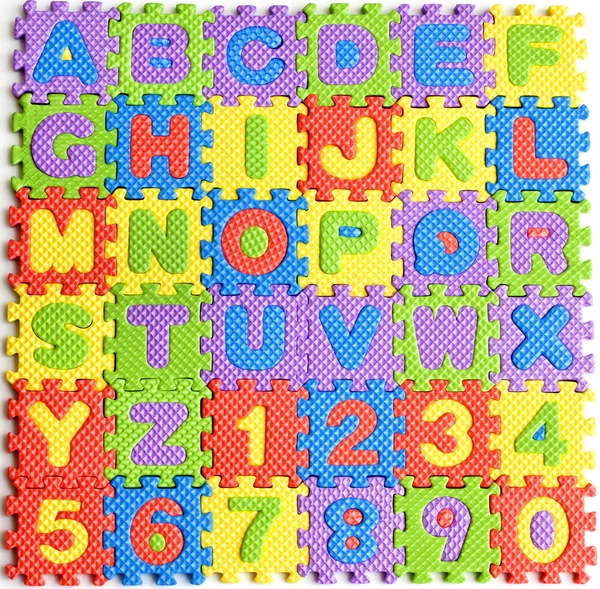 Kleurrijke letters nummers speelgoed abstracte achtergrond — Stockfoto