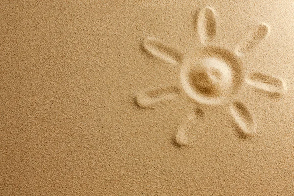 Sol sobre arena en playa vacaciones fondo signo concepto — Foto de Stock