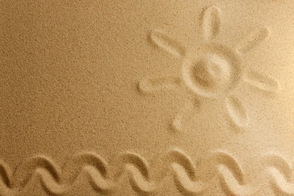 Sol sobre arena en playa vacaciones fondo signo concepto —  Fotos de Stock