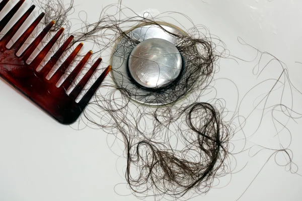 Perte de cheveux après le lavage de la tête Images De Stock Libres De Droits