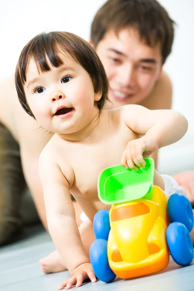 Baby with toy — Stock Photo, Image