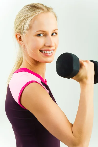 Girl with barbell — Stock Photo, Image