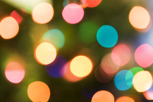 Colorful Christmas background with glittering lights