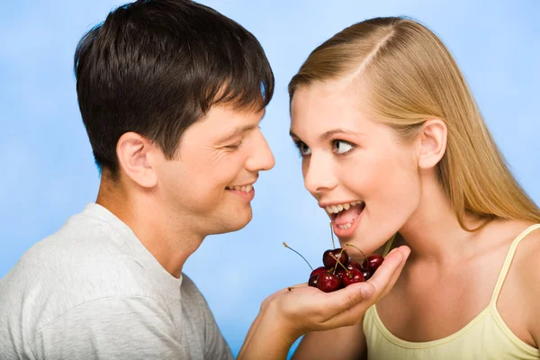 Sweet cherry in hand — Stock Photo, Image