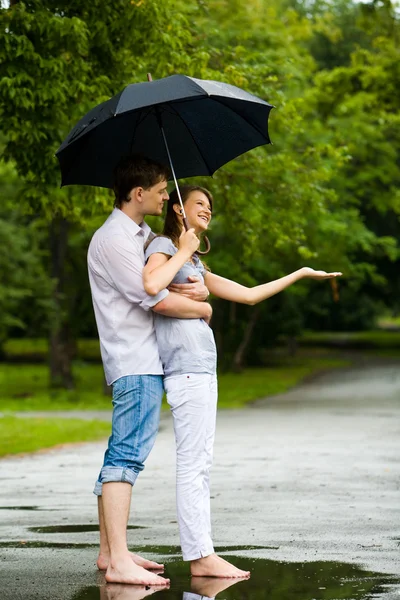 Under umbrella — Stock Photo, Image
