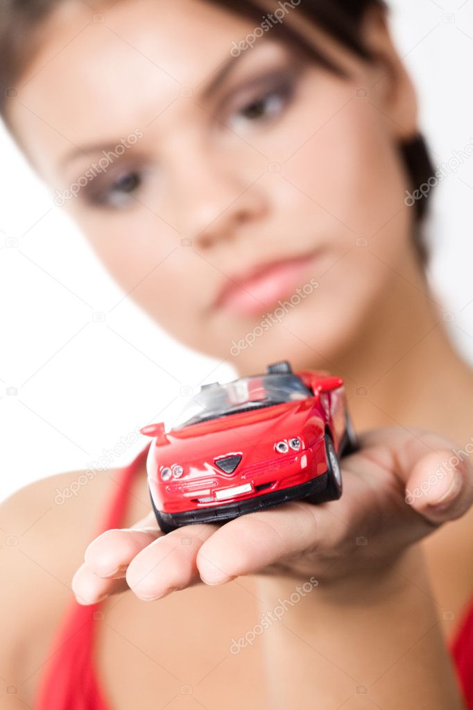 Woman holding toy car
