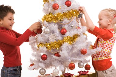 Decorating New Year tree clipart