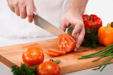 Cutting tomatoes clipart