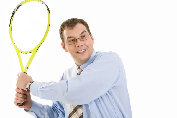 Liikemies tennismailalla — kuvapankkivalokuva