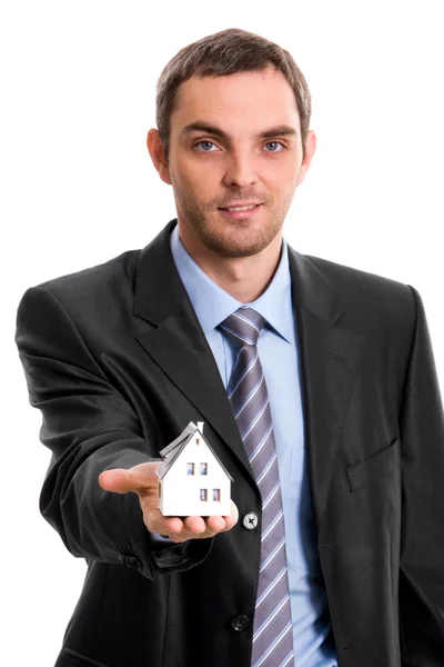 Man with toy house — Stock Photo, Image