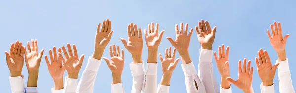 Raised hands — Stock Photo, Image