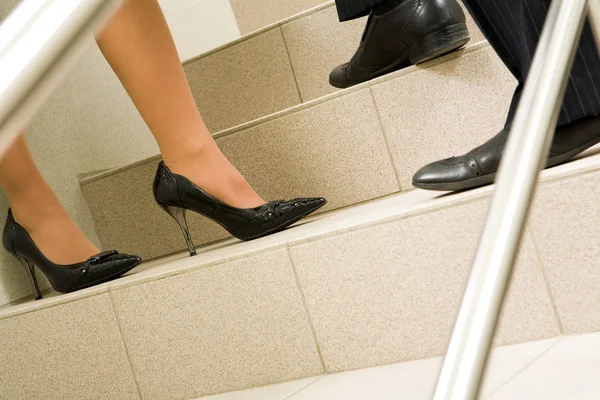 Legs on stairs — Stock Photo, Image