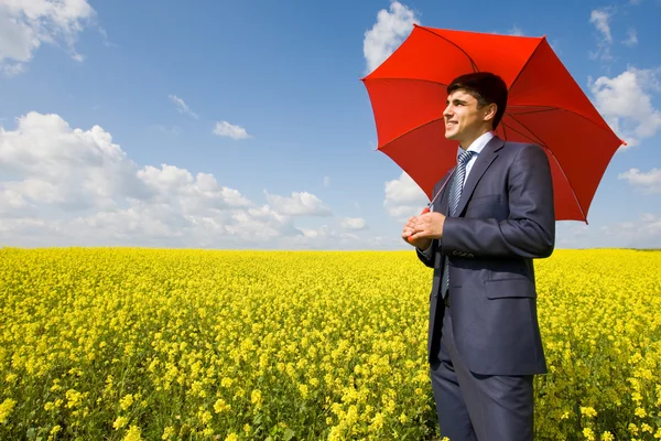 Muž pod deštníkem — Stock fotografie