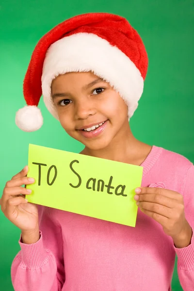 Happy girl holding letter with note to Santa — Stock Photo, Image