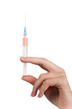 Syringe in hand clipart