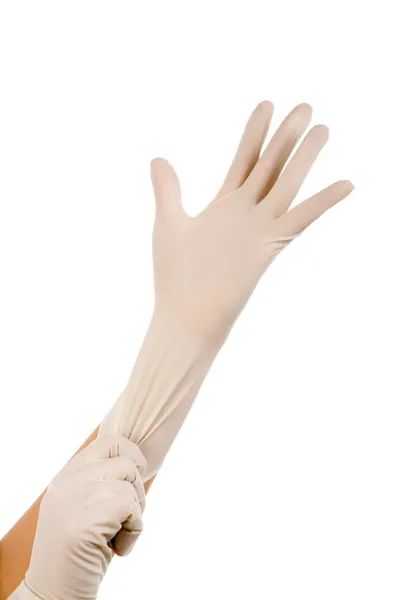Ponerse guantes — Foto de Stock