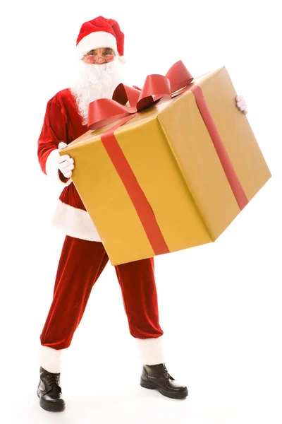 Санта с большим подарком — стоковое фото