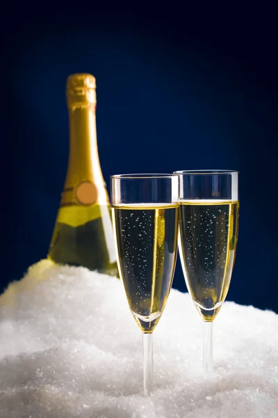 Champagne in snow — Stock Photo, Image