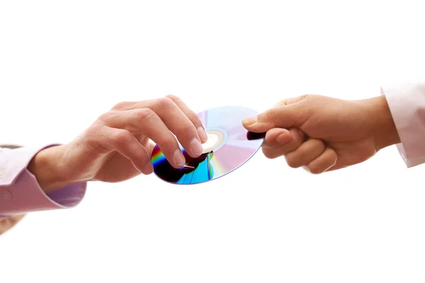 Passing compact disc — Stock Photo, Image
